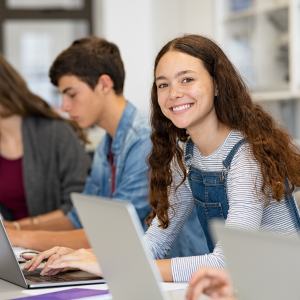 teens working on laptops